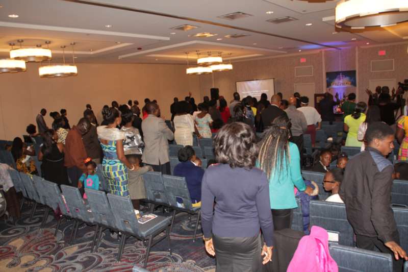 THE PACKED AUDITORIUM