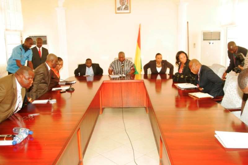 SOME MEMBERS OF THE COMMITTEE THAT INVESTIGATED CAUSES OF THE FRE AND MINISTERS OF STATE AT THE PRESENTATION OF THE REPORT TO VICE PRESIDENT MAHAMA