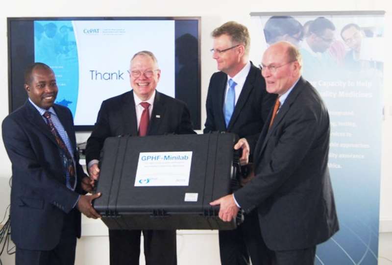 Handover Of The First Minilab In The GPFH - CePAT Alliance / From left to right: Kwesi Boateng (Country Manager CePAT), Michael Maves (Vice President USP), Frank Gotthardt (Chairman Of The GPHF And Head Of Public Affairs Of Merck) And Frank Stangenberg-Haverkamp (Chairman Of The Executive Board Of E. Merck KG)