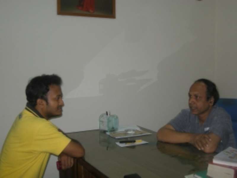 William Gomes interviewing Fr. Proshanto T. Rebiro, the parish priest of the Holy Rosary church. (PhotoDipal Barua)