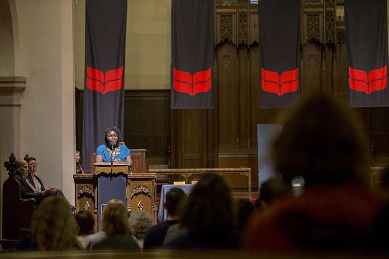Deborah Ahenkorah captures her audience in her passionate speech during the Grinnell Prize ceremony