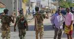Somali soldiers patrol a street after supporters of opposition political figures and state security forces clashed in Mogadishu in June. - AP Photo/Farah Abdi Warsameh - Farah Abdi Warsameh