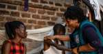Jane Mwesige combines medical and spiritual care as part of the Hospice AFrica Uganda team.  By Badru Katumba (AFP)