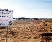 Photo shows a sign marking the turn-off leading to the Hamama gold exploration site, deep in the desert east of Luxor, Egypt, April 15, 2016. -  Brian Rohan, AP