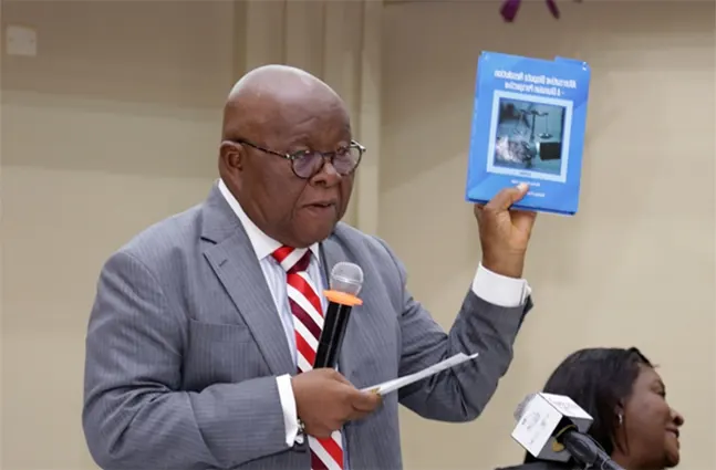 Prof. Aaron Mike Oquaye launching the book