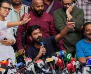 Abhijeet Dipke, founder of the Cockroach Janta Party, centre, Neha Bora, president of the All India Students Association, left, and Indian actor Prakash Raj, right, address a press conference in New Delhi, Thursday, October 15, 2026. -  Manish Swarup, AP