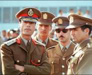 Circa 1970: Muammar Qaddafi with members of the Free Unionist Officers who later formed the Revolutionary Command Council. Far right is Abu-Bakr Yunis Jabr who, at 71 years of age, was captured alongside Qaddafi at the Battle of Sirte.