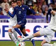 Michael Olise in action for France against Italy in the UEFA Nations League at the Stade de France in Saint-Denis, near Paris on October 2, 2026. -  Franck Fife, AFP