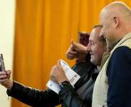 Cover image: Latvian Prime Minister Andris Kulbergs takes a selfie with a voter during a general election in Riga, on October 3, 2026. Ints Kalnins, Reuters