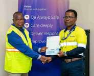 Mr. Charles Bissue, the General Manager of Newmont Ahafo North Mine (right) presenting the cheque to Prof. Julius Ceaser Puoza, the Pro-VC of STU