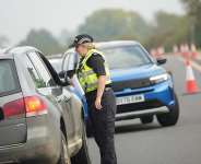 File photo of police officers  at a checkpoint near RAF Fairford air base, in Fairford, UK, taken September 29, 2026. -  Alastair Grant, AP