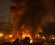 Fire and smoke rise in the city during a Russian missile and drone strike in Kyiv, Ukraine on October 7, 2026 - Vladyslav Sodel, Reuters