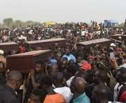 Christians in Nigeria take part in funeral festivities in April 2019.  Intersociety