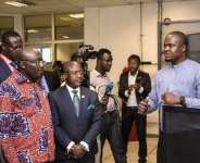 Yayra Koku, explaining a point to Dr. Mahamudu Bawumia then Vice President