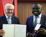 President Frank-Walter Steinmeier and Gerald Asamoah