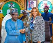 NIMC DG (R) in a handshake with the NPC Chairman