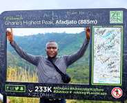 Journalist, Dela Ahiawor at the top of Mt. Afadja