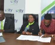 PHOTO NEWS: Unity Bank signs Adekunle Gold as Brand Ambassador