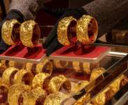 Gold edges higher as inflation jitters ease; key US data in focus