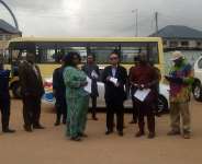 Members of the Commission and police personnel visit the shooting scene