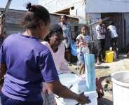 COVID – 19: Sanitation Minister Tour Homes; Educate Ghanaians On Judicious Use Of Free Water