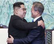 Kim Jong-Un and Moon Jae-in hugging after the meeting (AP)
