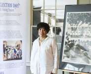 Doreen Wade with a part of her exhibit at the Negro Election Day commemoration /  Salem United Inc.