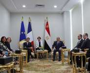 Frances President Emmanuel Macron (center L) and his Egyptian counterpart Abdel Fattah al-Sisi (center R) attend their bilateral meeting at the Senghor University in Borg el-Arab, near the Mediterranean coastal city of Alexandria on May 9, 2026. - AFP - LUDOVIC MARIN