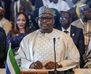 Minister of Foreign Affairs Timothy Kabba, pictured at an Ecowas meeting in Abuja in December 2025, has said Sierra Leone will take in hundreds of West African migrants deported from the US. - AFP - LIGHT ORIYE TAMUNOTONYE
