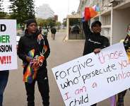 LGBTQ activists in Botswana respond to the Coalition of Botswana Christian Churches against homosexuality, July 22, 2023 that protested legislation seeking to make same-sex relation legal. - AFP - MONIRUL BHUIYAN