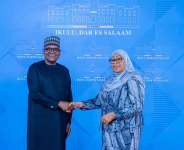 Aliko Dangote with President Samia Suluhu Hassan