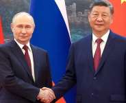 Russias President Vladimir Putin visits his Chinese Xi Jinping in Beijing, days after US leader Donald Trump. -  Maxim Stulov / POOL/AFP