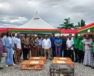 Beneficiaries in pose with Volta Regional Minister, National Coordinator of Feed Ghana and other dignitaries