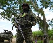 A Colombian soldier stands guard at a checkpoint set up ahead of the upcoming Colombian presidential election on May 31, in Jamundi, Colombia on May 26, 2026. - Jair Coll, Reuters