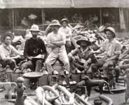 Members of the notorious British Punitive Exhibition of 1897 posing proudly with looted Benin ivories and bronze objects.
