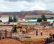 Zambian workers build a copper smelter in Chingola, Zambia. Zambia has accused the United States of linking a proposed health deal to negotiations over critical minerals access. - ASSOCIATED PRESS - Joseph Schatz