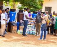 Mr. Akum-Nyemi donating the medical items to the health centres Directors on behalf of ToH