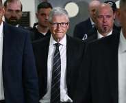 Microsoft co-founder Bill Gates (center) arrives for a closed-door hearing before a US congressional committee regarding the Epstein case, June 10, 2026, Washington -  Kent NISHIMURA, AFP
