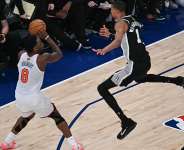 Victor Wembanyama of the Spurs attempts to bother OG Anunoby of the Knicks during Game 3 of the NBA Finals, June 8, 2026, in New York -  SAUL LOEB, AFP