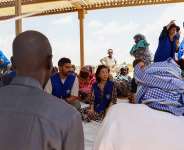 In eastern Chad, at the Adr border crossing, IOM Deputy Director SungAh Lee met with some of the families that fled the conflict in Sudan. Photo: IOM Chad/2026.