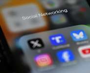 Britains government hopes to totally ban social media for under-16s and stop late-night scrolling by older teenagers. -  Justin Tallis, AFP/ File