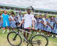 Great Victory Academy donates bicycle to James Kumbeni ahead of climate advocacy ride to Benin