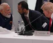 Indian Prime Minister Narenda Modi talks to President Donald Trump before the plenary session at the G7 summit, June 16, 2026, in Evian-les-Bains, France. -  Julia Demaree Nikhinson, AFP