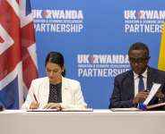 From file: UK Home Secretary Priti Patel signs the agreement with the Rwanda Foreign Affiars Minister Vincent Biruta April 14, 2022  Photo: Olivier Muhizi / AP / Picture alliance