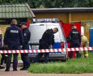 Police work at a crime scene covered with a tent in Biala Podlaska, eastern Poland on June 16, 2026, where a Russian artist was shot dead. -  Piotr Pyrkosz, AFP