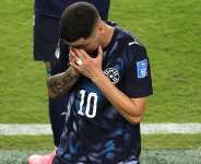 Paraguays Miguel Almiron became the first player to be sent off at the World Cup for coverning his mouth while talking to an opponent during a match. - Getty Images via AFP - STU FORSTER