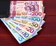 Ghanaian Cedi Defies Global Turmoil, Holds Steady Amidst Israel-Iran War