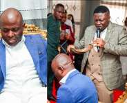 Prophet Emmanuel Worlasi,  head pastor of Conquerors Chapel International, Kumasi, praying for Chairman Coka during his visit to the church.