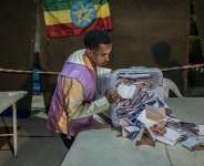 National Election Board of Ethiopia officials sort and count ballots at the Shalla Park polling station during the general election in Addis Ababa, Ethiopia, 2 June 2026.` -  Amanuel Sileshi/AP