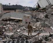 A Lebanese soldier stands in front of a destroyed branch of the Lebanese Central Bank in the town of Nabatiyeh, southern Lebanon, on June 22, 2026. -  Mohammed Zaatari, AP